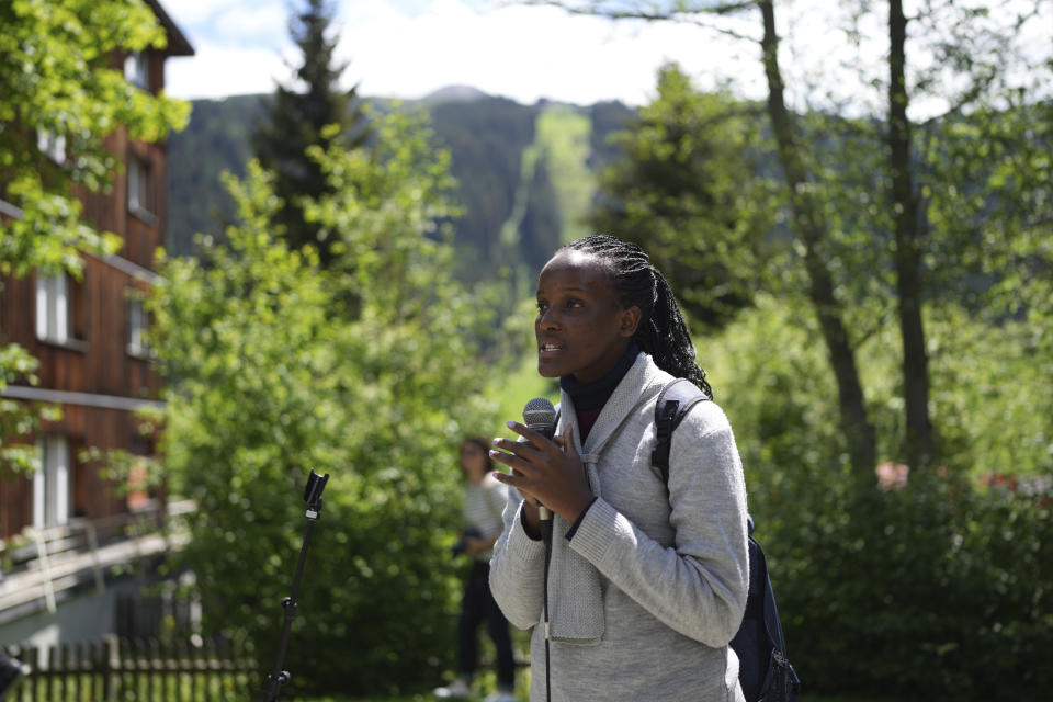 Climate activist Vanessa Nakate of Uganda speaks during a climate protest alongside the World Economic Forum in Davos, Switzerland, Thursday, May 26, 2022. The annual meeting of the World Economic Forum is taking place in Davos from May 22 until May 26, 2022. (AP Photo/Evgeniy Maloletka)