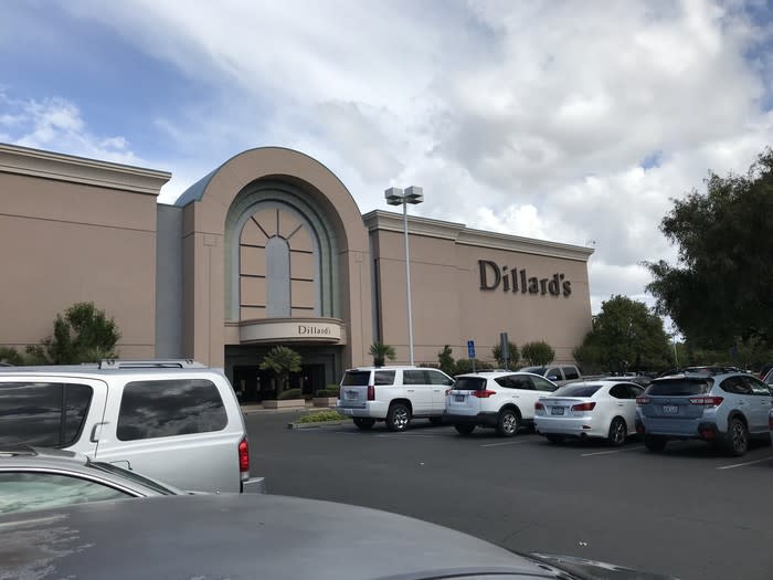 The parking lot and exterior of a Dillard's store