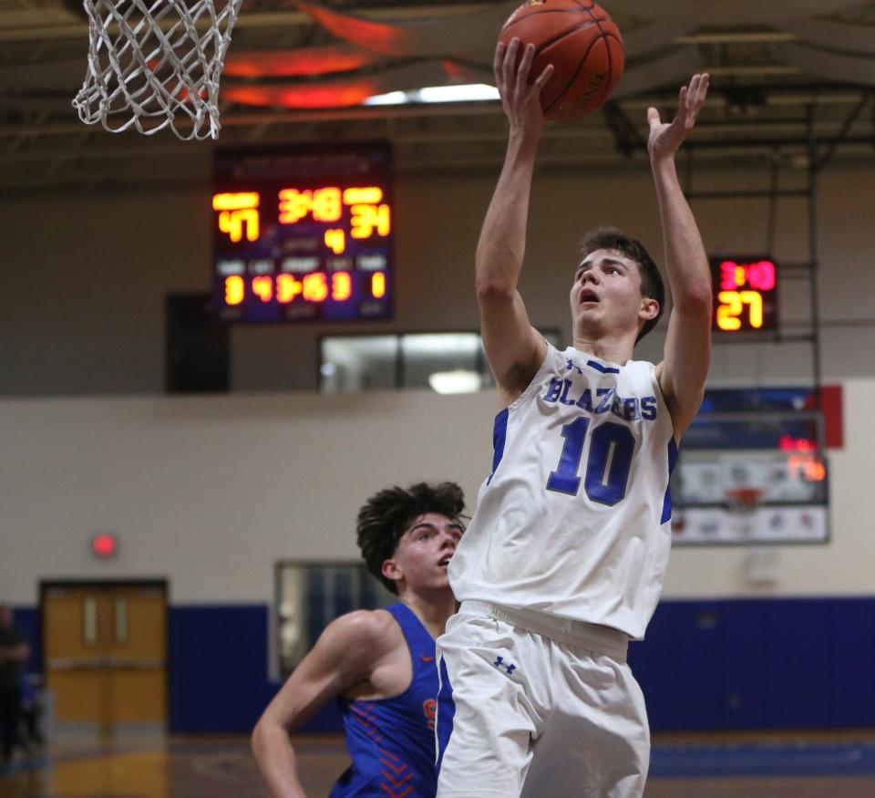 Millbrook's Owen Iannucci takes a shot during the Section 9 Class C championship versus SS Seward on February 28, 2024.