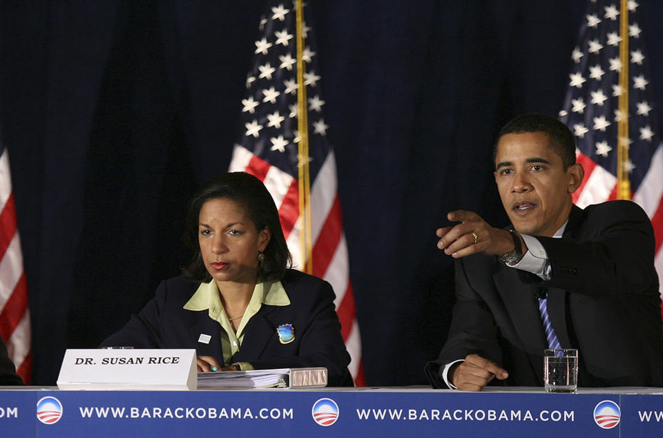 In this file photo of Dec. 18, 2007, then-Democratic presidential hopeful, Sen. Barack Obama, D-Ill., right, takes a question from the audience at a foreign policy forum in Des Moines, Iowa, joined at left by  former Assistant Secretary of State Susan Rice who served in the Clinton administration. (Kevin Sanders/AP Photo)