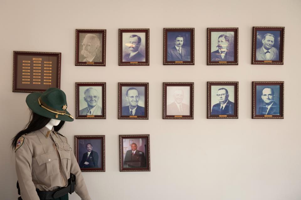 Photos of former sheriffs remain in the lobby entrance of the Tunica County Justice Complex in Tunica on Dec. 22, 2023.