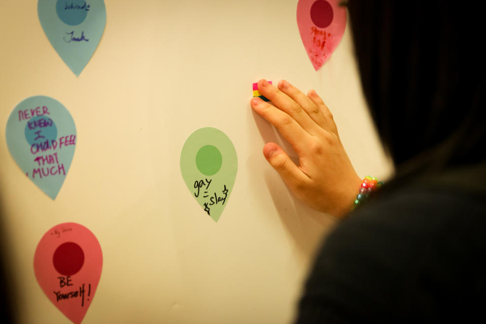 Some participants posted slogans and rainbow flag stickers on the message board.