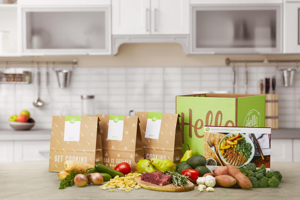 This product display image released by HelloFresh shows ingredients offered from their home delivery meal kits. The growing options for outsourcing meal planning, grocery shopping and cooking can be called time-saving blessings or culture-destroying curses. In the end, they're probably a complicated mix of both. (HelloFresh via AP)