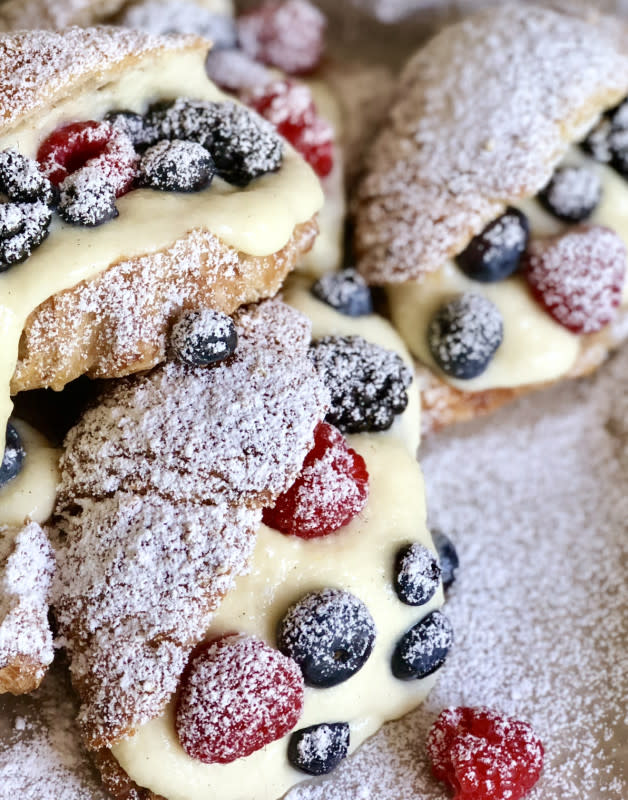 <p>These berry and greek custard stuffed croissants are perfect for summer.</p><p><strong>Get the recipe: <a href="https://theirreverentkitchen.com/2018/07/26/summer-berry-and-greek-custard-stuffed-croissant/" rel="nofollow noopener" target="_blank" data-ylk="slk:Summer Berry and Greek Custard Stuffed Croissants;elm:context_link;itc:0;sec:content-canvas" class="link rapid-noclick-resp"><em>Summer Berry and Greek Custard Stuffed Croissants</em></a></strong></p>