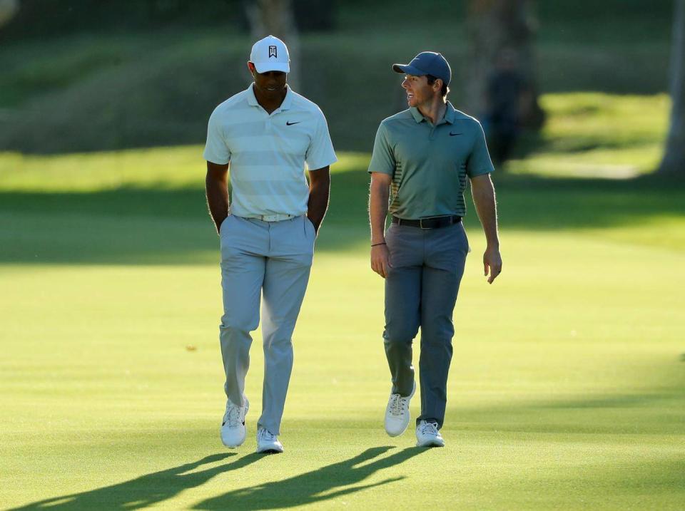 Tiger Woods and Rory McIlroy during the second round (Getty)