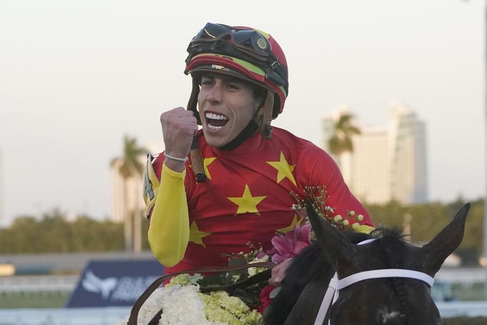 Jockey Irad Ortiz Jr., riding Life is Good, celebrates after winning the Pegasus World Cup Saturday at Gulfstream Park.