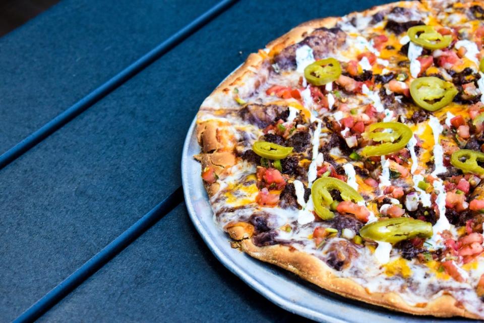 Pizza Man's “Taco-Bout A Hero” pizza will be available through Sept. 30.