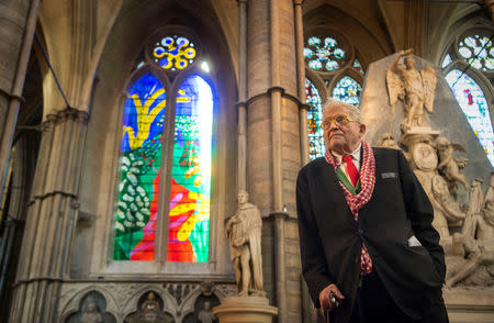 British artist David Hockney poses in front of The Queen's Window, a new stained glass window he has designed, at Westminster Abbey in London, Britain, September 26, 2018. Victoria Jones/Pool via REUTERS