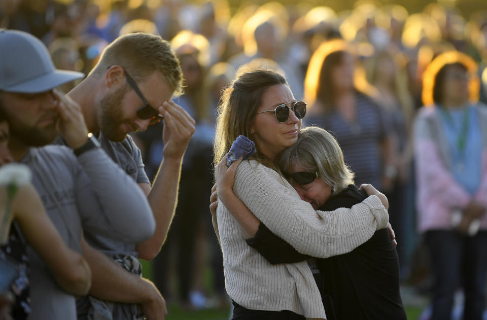 Attendees grieve during a vigil Friday, Sept. 6, 2019, in Santa Barbara, Calif., for the victims who died aboard the dive boat Conception. The Sept. 2 fire took the lives of 34 people on the ship off Santa Cruz Island off the Southern California coast near Santa Barbara. (AP Photo/Mark J. Terrill)