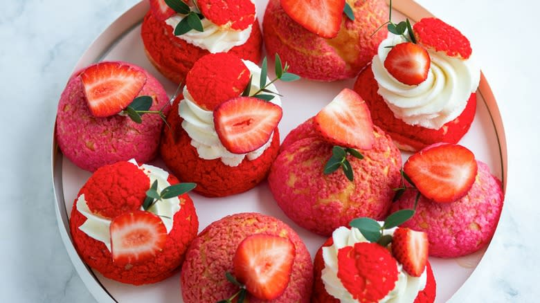 strawberry shu cream pastries on plate