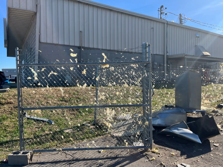 Insulation shreds litter the parking lot of the warehouse in Madison where NB Goods stored its inventory. (Photo: WKRN)