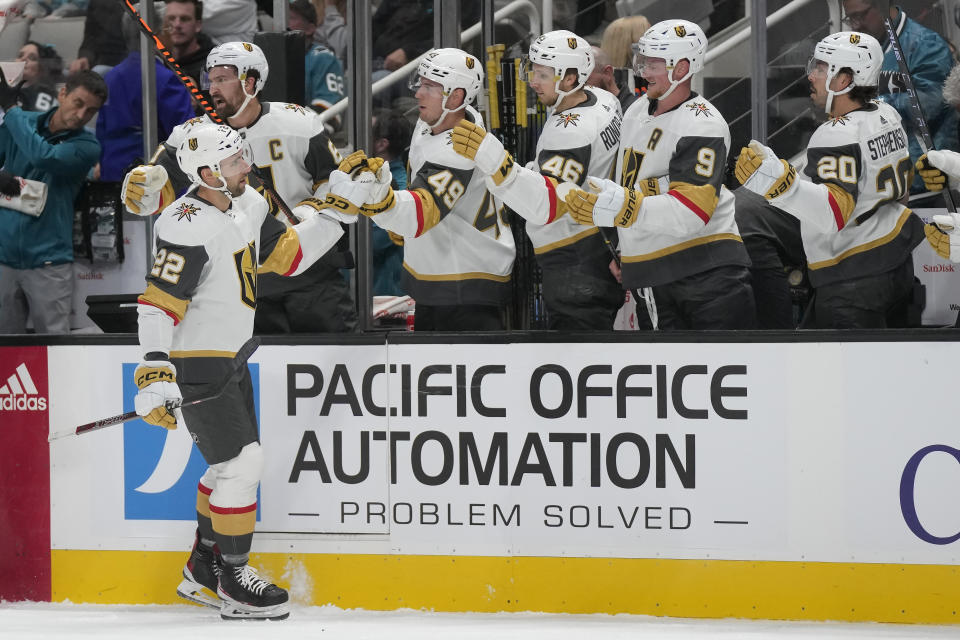 Vegas Golden Knights right wing Michael Amadio (22) is congratulated after scoring against the San Jose Sharks during the first period of an NHL hockey game in San Jose, Calif., Thursday, Oct. 12, 2023. (AP Photo/Jeff Chiu)