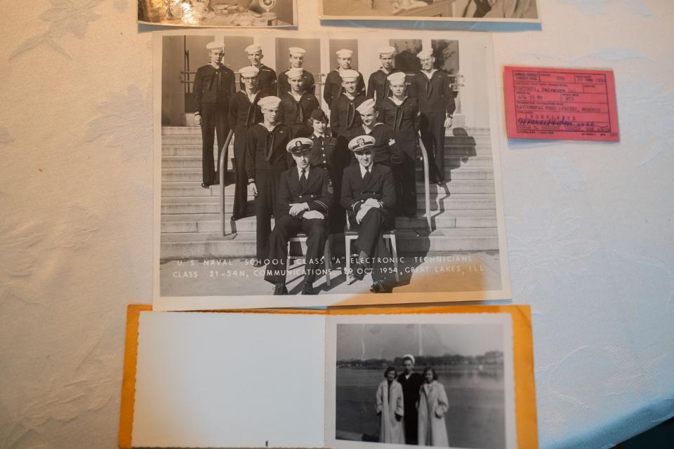 Sal Martocci reminisces on his time serving during the Korean War while looking at old photographs Wednesday, April 10, 2024.