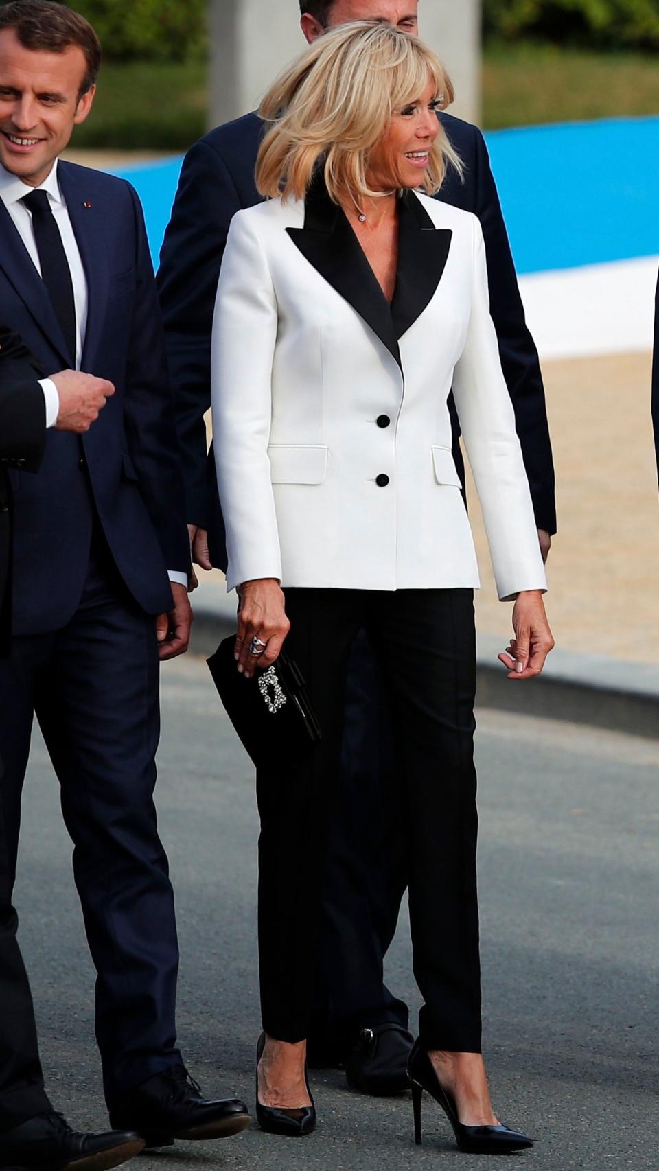 <p>WHO: Brigitte Macron</p> <p>WHAT: Louis Vuitton, Roger Vivier bag</p> <p>WHERE: At the NATO summit dinner, Brussels</p> <p>WHEN: July 11, 2018</p>