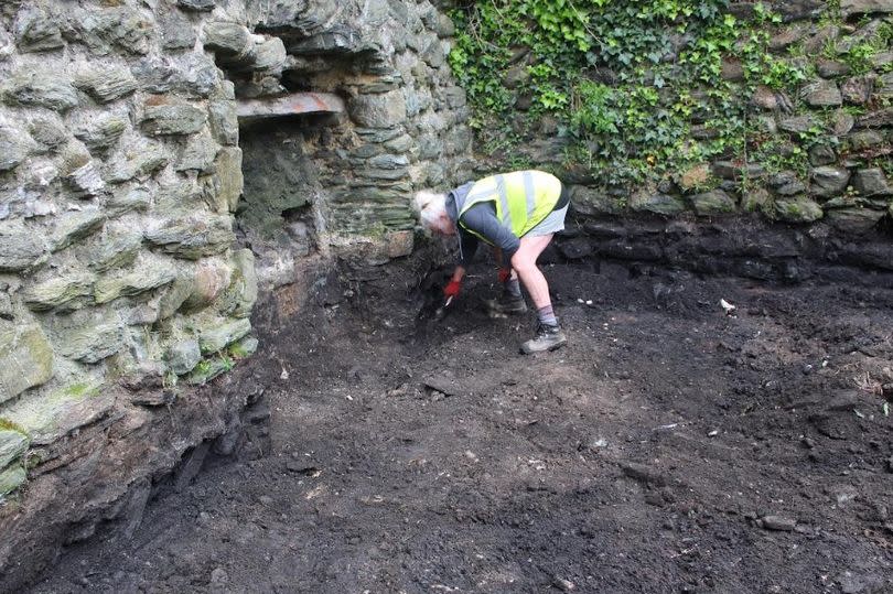 Heneb Gwynedd archaeologist Anne-Marie Oattes working on the dig site at Holyhead