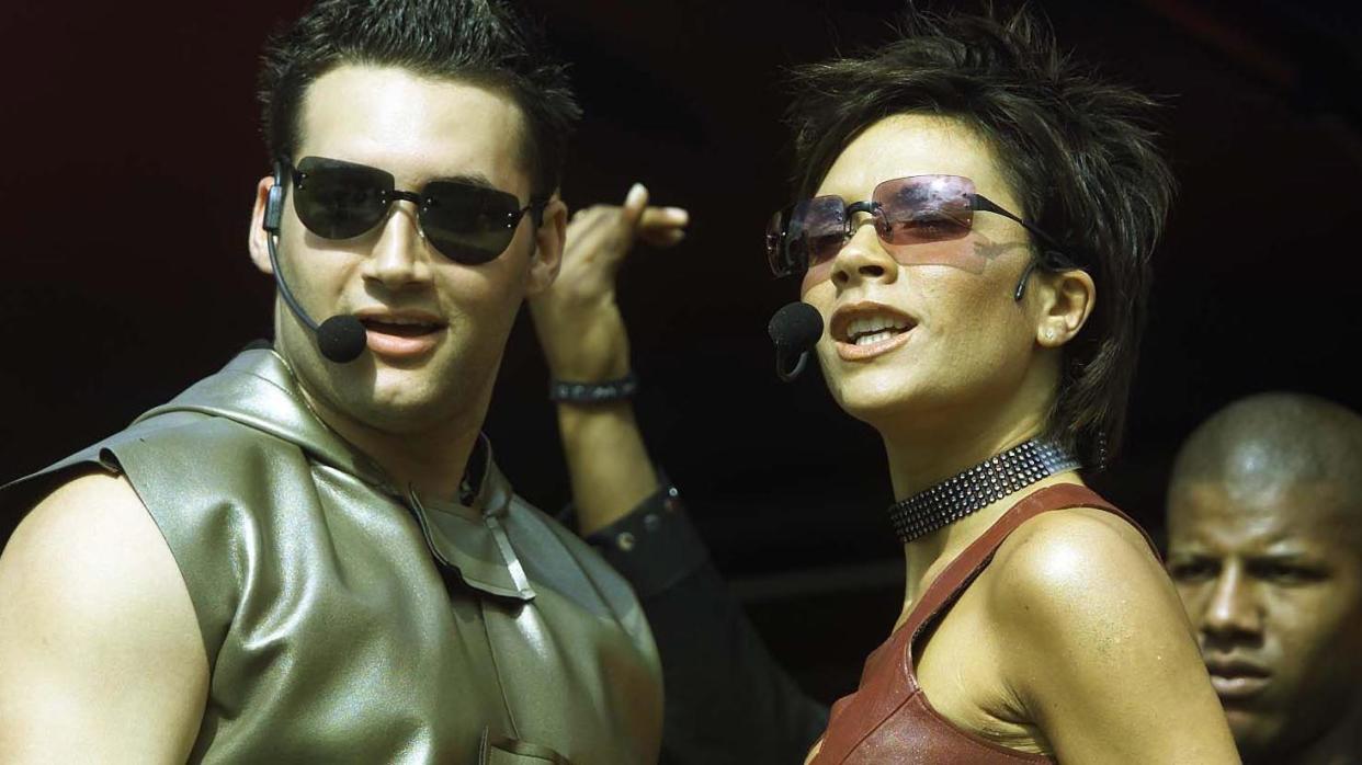 Victoria Beckham and Dane Bowers perform at the Radio 1 Roadshow in 2000