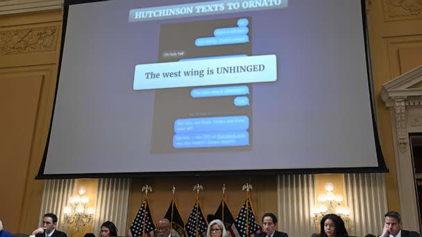 PHOTO: An evidence document with the message from Cassidy Hutchinson reads 'The West wing is UNHINGED' is shown on a screen during a full committee hearing on 'the January 6th Investigation,' on Capitol Hill ,  July 12, 2022. (Saul Loeb/AFP via Getty Images)