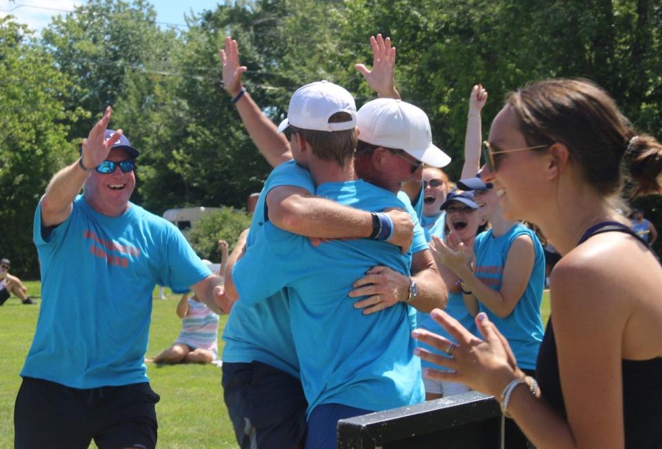 The Baumanucci Bombers celebrate their victory after their game ended with a walk-off homerun during The Tommy McNamara Charitable Foundation's annual whiffle ball tournament on July 30. The competition is a major fundraiser for the organization, which recently announced it is donating $75,000 toward the new athletic complex currently under construction at Kennebunk High School.