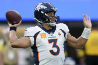 Denver Broncos quarterback Russell Wilson passes during the first half of an NFL football game between the Los Angeles Rams and the Denver Broncos on Sunday, Dec. 25, 2022, in Inglewood, Calif. (AP Photo/Marcio J. Sanchez)