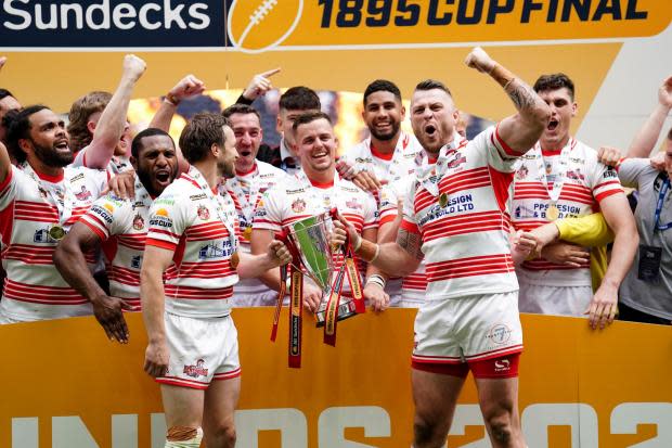 Leigh Centurions pair Joe Mellor (left) and Adam Sidlow (right) lift the AB Sundecks 1895 Cup at the Tottenham Hotspur Stadium. Picture: Mike Egerton/PA Wire