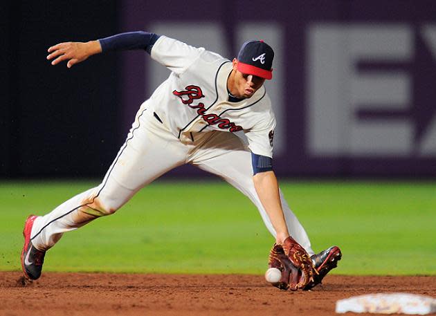 Oblique strain slows Braves' Andrelton Simmons