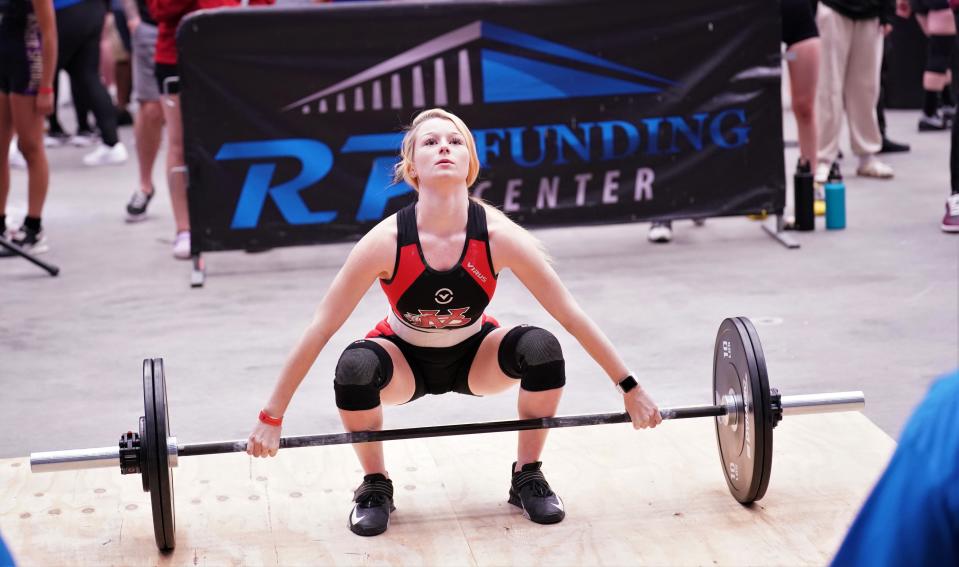 Vero Beach's Cayle Bihl competes in the snatch event as part of the Olympic lifts portion of the FHSAA Girls Weightlifting Championships that took place on Saturday, Feb. 18, 2023 at the RP Funding Center in Lakeland.