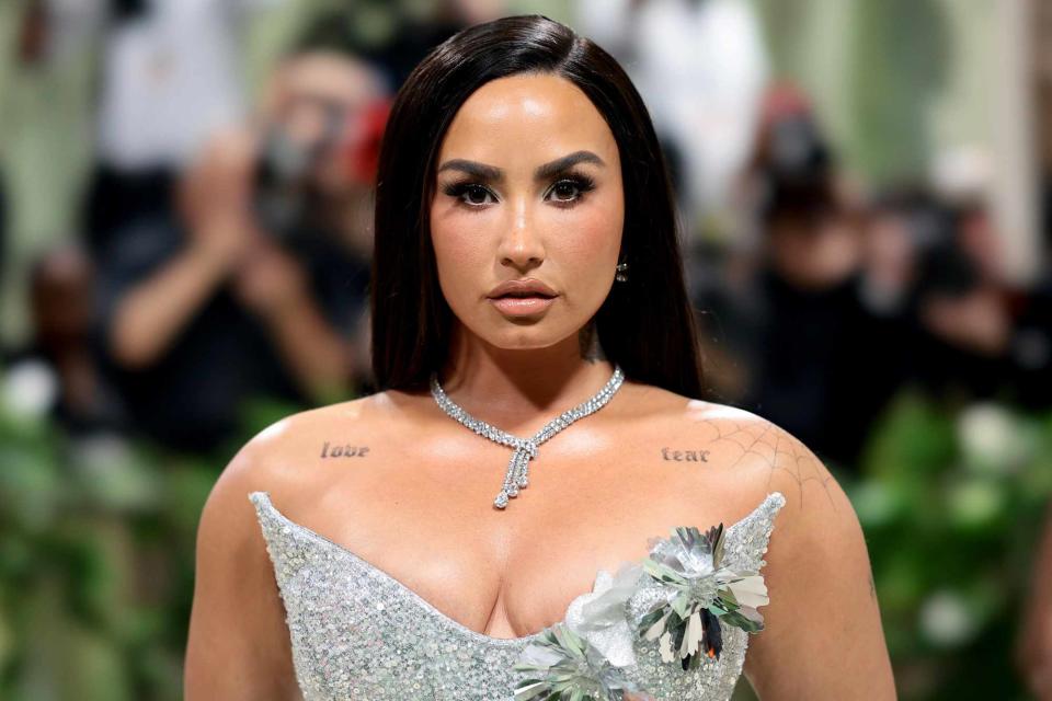 <p>Dimitrios Kambouris/Getty</p> Demi Lovato at 2024 Met Gala
