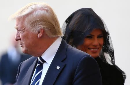 U.S. President Donald Trump and first lady Melania Trump arrive to meet Pope Francis at the Vatican, May 24, 2017. REUTERS/Alessandro Bianchi