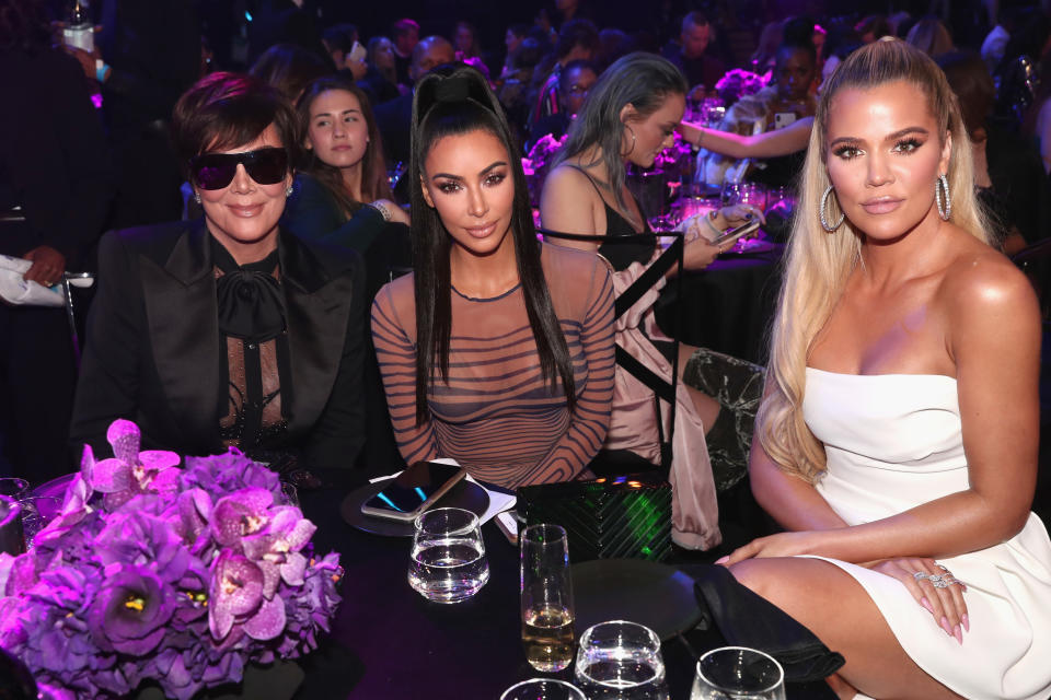 Kris, Kim, and Khloé at a table