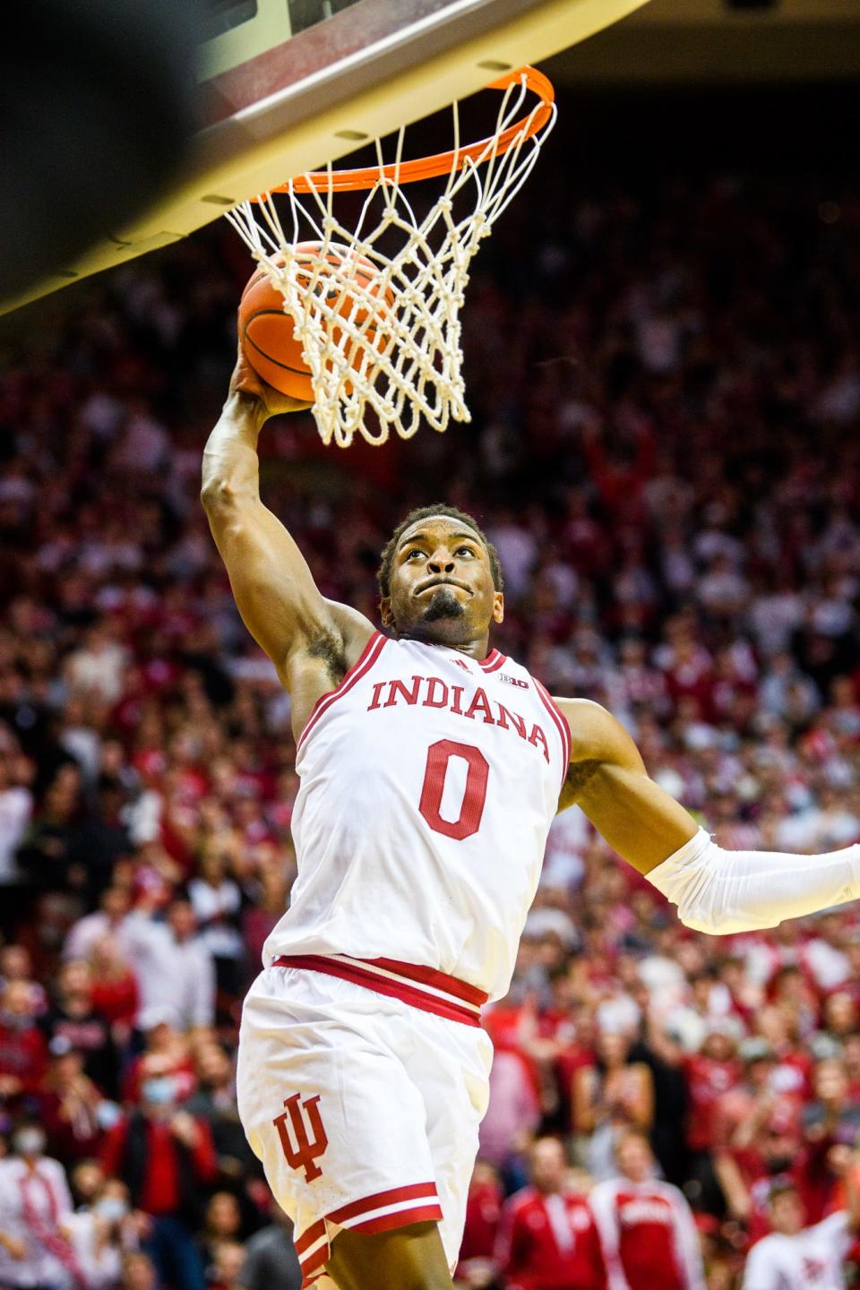 Indiana's Xavier Johnson (0) dunks during the second half of the Indiana versus Rutgers men's basketball game at Simon Skjodt Assembly Hall on Wednesday, March 1, 2022.