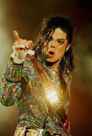 <p>Dave Benett/Getty</p> Michael Jackson on his 'Dangerous' World Tour, on July 30, 1992.