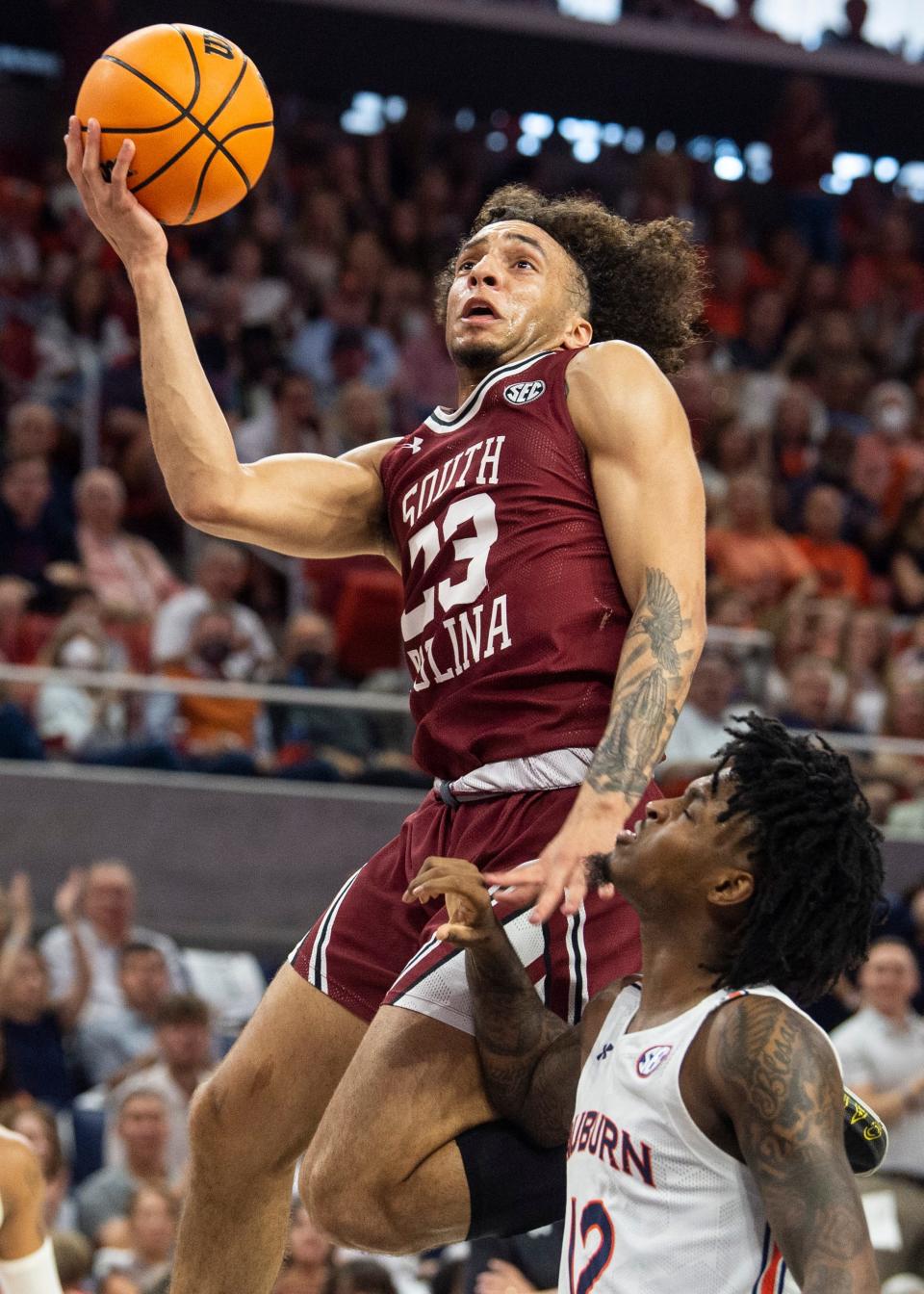 South Carolina guard Devin Carter drives to the basket during a game last month against Auburn. On Sunday, he committed to PC.