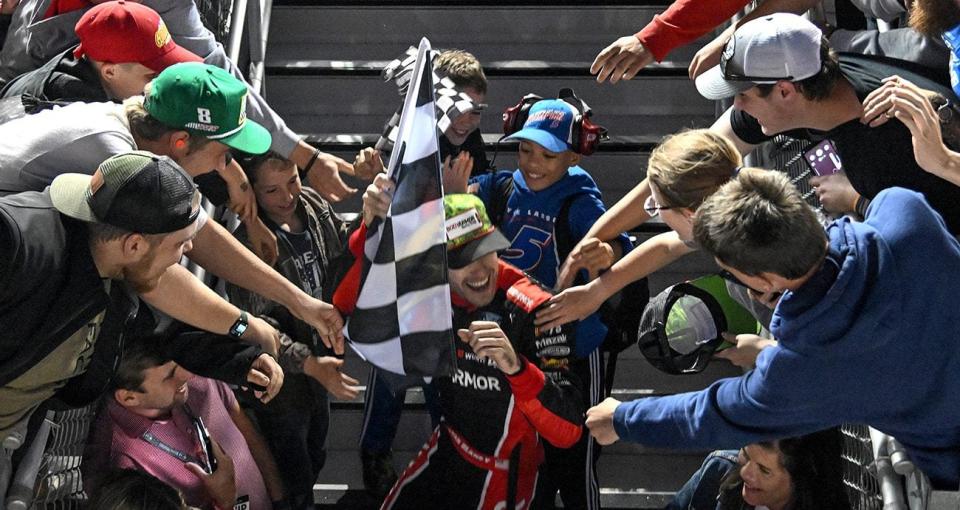 ryan blaney celebrates with fans