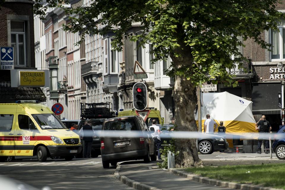 Emergency services cordon off the scene of the shooting in the Belgian city of Liege. Source: AFP via Getty