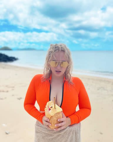 <p>Rebel Wilson/Instagram</p> Rebel Wilson posts from the beach in Fiji