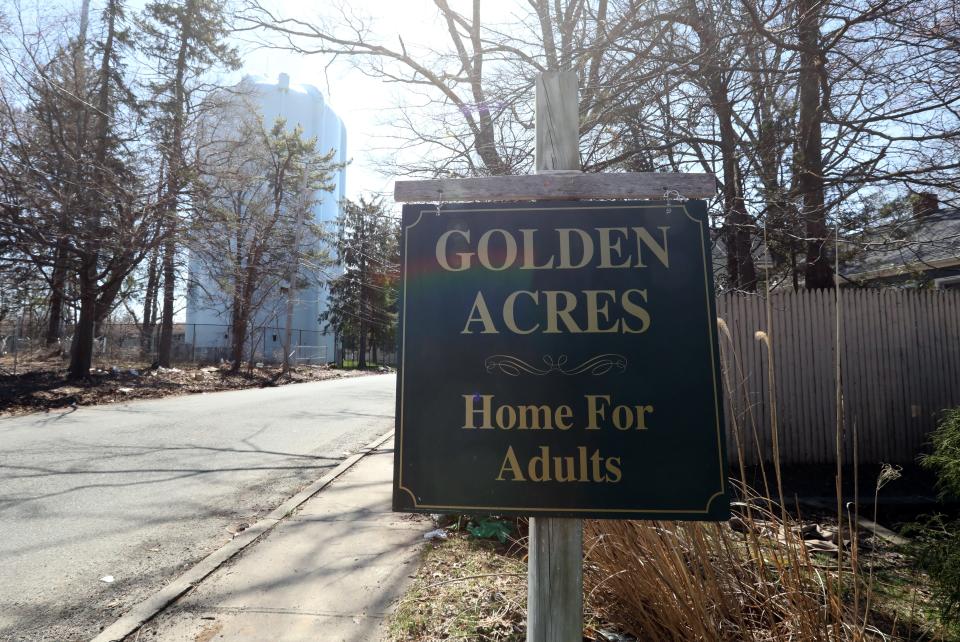 A sign for the Golden Acres Home for Adults in Spring Valley.