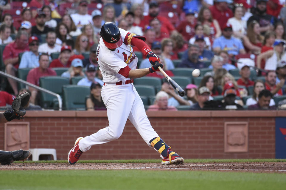 St. Louis Cardinals' Nolan Arenado (28) hits a two-run home run during the fourth inning of a baseball game against the San Francisco Giants on Sunday, May 15, 2022, in St. Louis. (AP Photo/Joe Puetz)