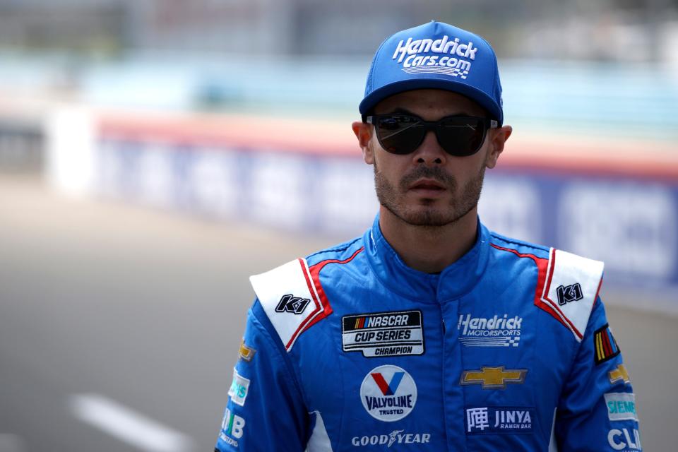 Kyle Larson, driver of the No. 5 HendrickCars.com Chevrolet, walks the grid during qualifying for the NASCAR Xfinity Series Shriners Children's 200 at The Glen at Watkins Glen International on August 19, 2023 in Watkins Glen, New York.