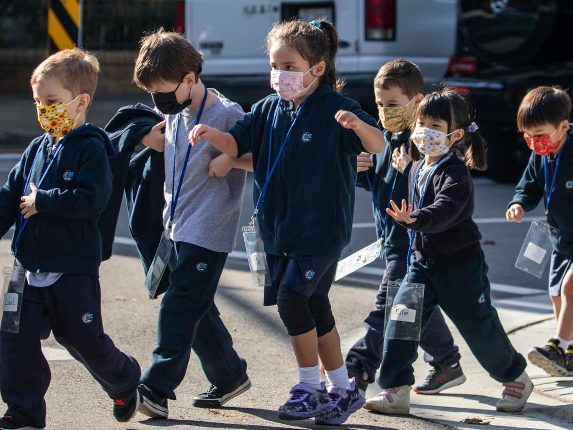 Students are pictured wearing masks during a school day in Vancouver, British Columbia on Friday, October 1, 2021.  (Ben Nelms/CBC - image credit)