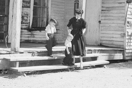 Carolyn Bryant and her sons are shown leaving Sharkey Community