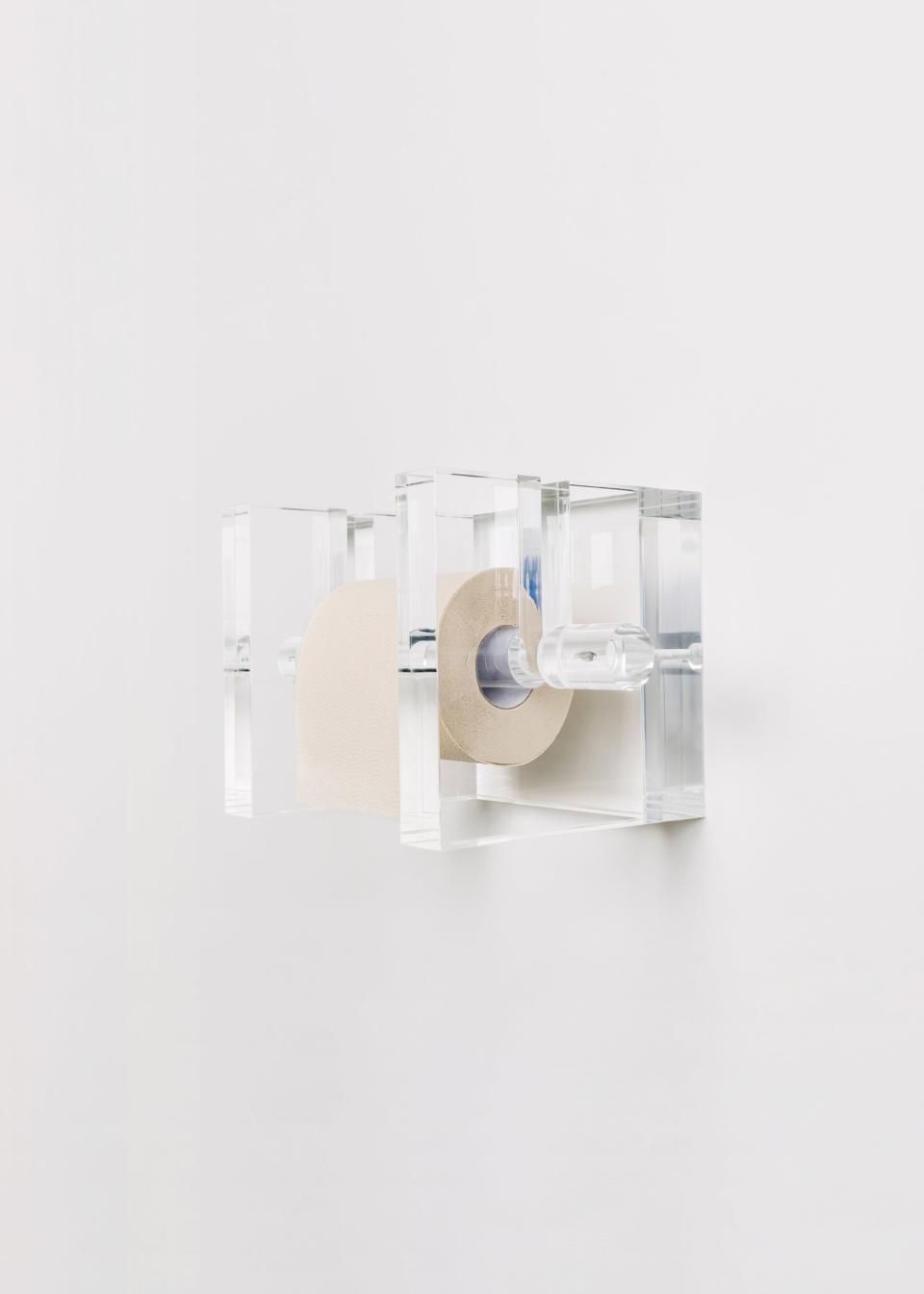 This chic acrylic holder is by Another Human.