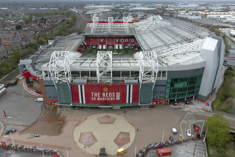 Manchester United's Old Trafford Stadium is seen after the collapse of English involvement in the proposed European Super League, Manchester, England, Wednesday, April 21, 2021. Manchester United executive vice-chairman Ed Woodward will step down from his role at the end of 2021 an announcement which came before Manchester United, along with the other five Premier League sides involved in the proposed European Super League (ESL), withdrew from the competition. (AP Photo/Jon Super)