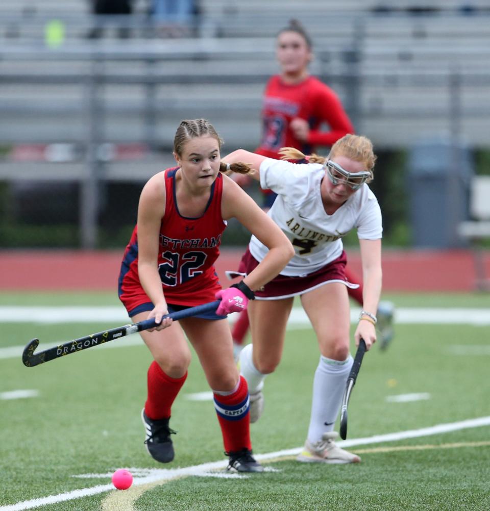 Ketcham's Katie Sauve gathers a loose ball against Arlington during a Sept. 28, 2023 field hockey game.