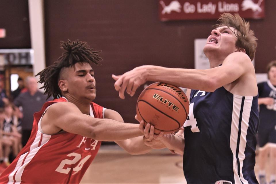 Cooper's Jalen Cherry of the South team fights Tolar's Grady McQuain of the North for a rebound. The South beat the North 89-73 in the Big Country FCA's All-Star Men's Basketball Game on Saturday, June 4, 2022, at Brownwood High School.