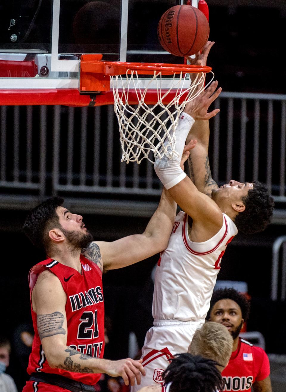 Bradley's Ja'Shon Henry puts up a shot over ISU's Dusan Mahorcic in the first half Thursday, Feb. 18, 2021 at Carver Arena.