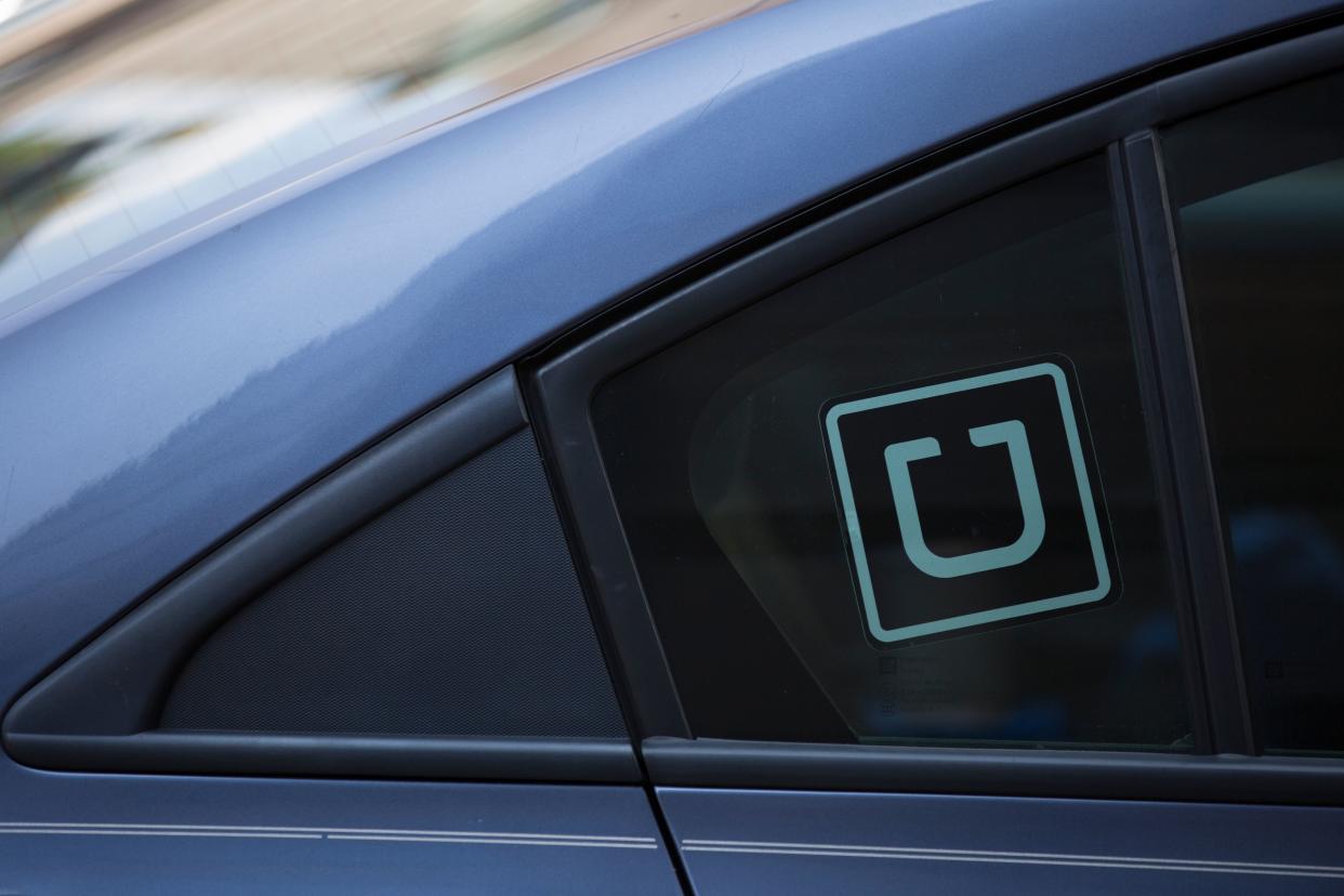 The Uber logo is seen on a car in Washington, DC, on July 9, 2019. (Photo by Alastair Pike / AFP)        (Photo credit should read ALASTAIR PIKE/AFP/Getty Images)