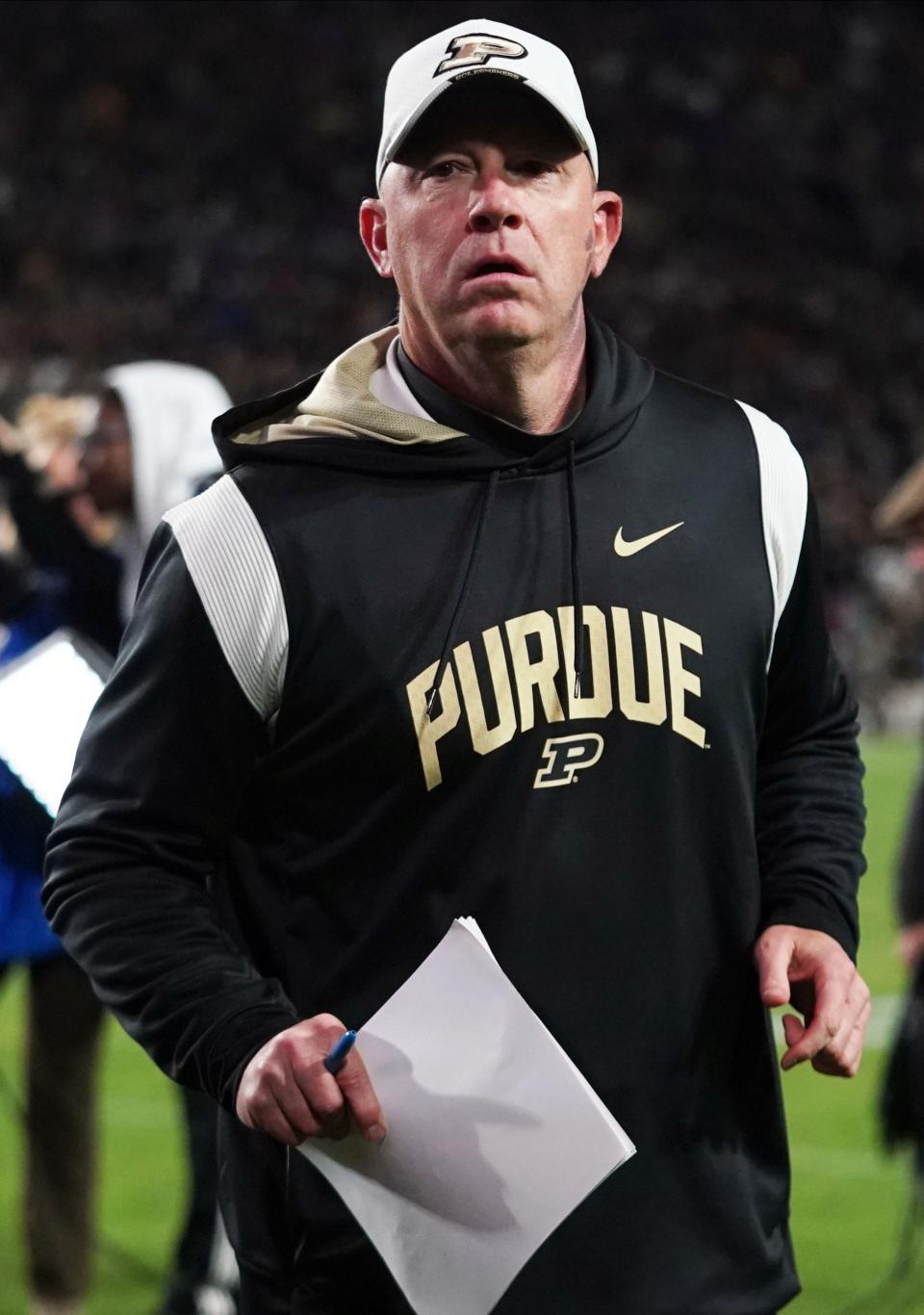 Oct 15, 2022; West Lafayette, Indiana, USA; Purdue Boilermakers head coach Jeff Brohm runs off the field at halftime at Ross-Ade Stadium. Mandatory Credit: Robert Goddin-USA TODAY Sports