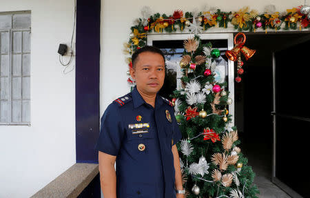 Police Superintendent Lito Patay, regional chief of the Criminal and Investigation Detection Group (CIDG), poses outside his office at Camp Olivas police camp in San Fernando, Pampanga in the Philippines December 11, 2017. REUTERS/Erik De Castro