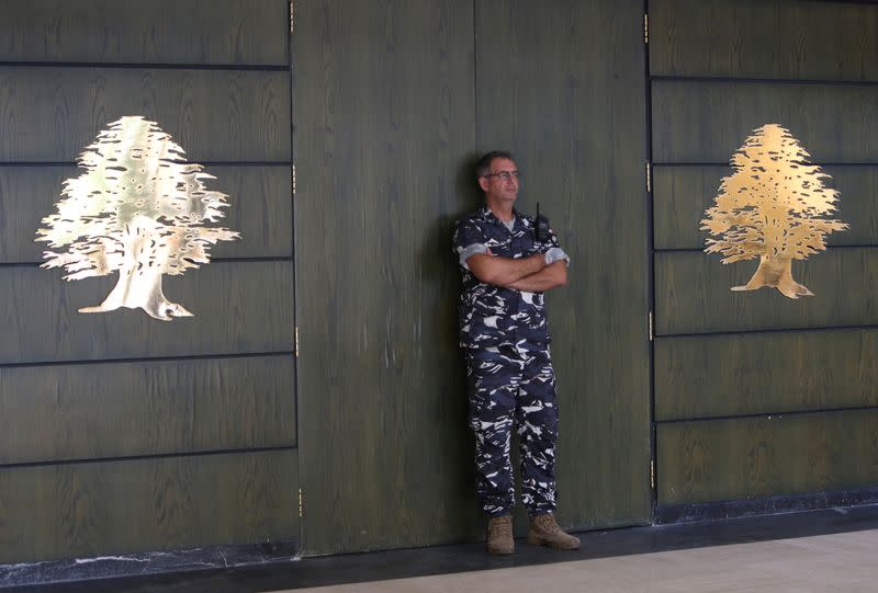 Security officer stands guard outside UNESCO Palace in Beirut