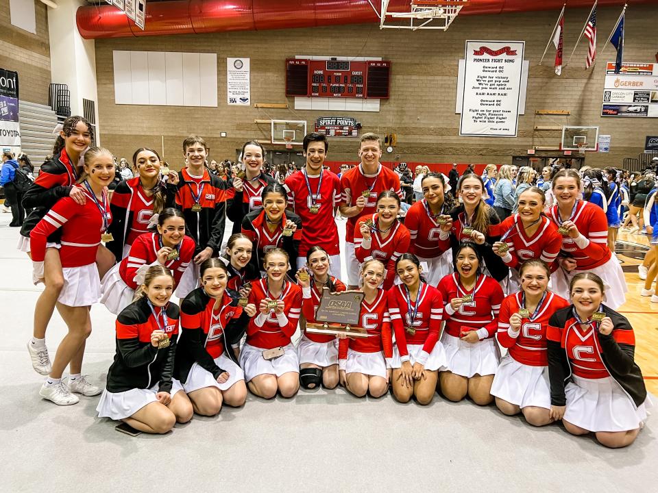 Central High School holds its OSAA 6A/5A co-champion title at the cheerleading state championships at Oregon City High School in Oregon City on Feb. 11.